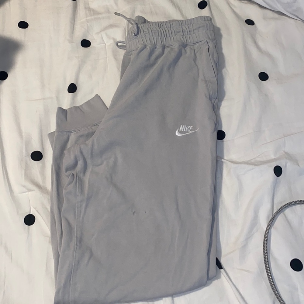Nike Women’s Joggers with logo. Small hole.